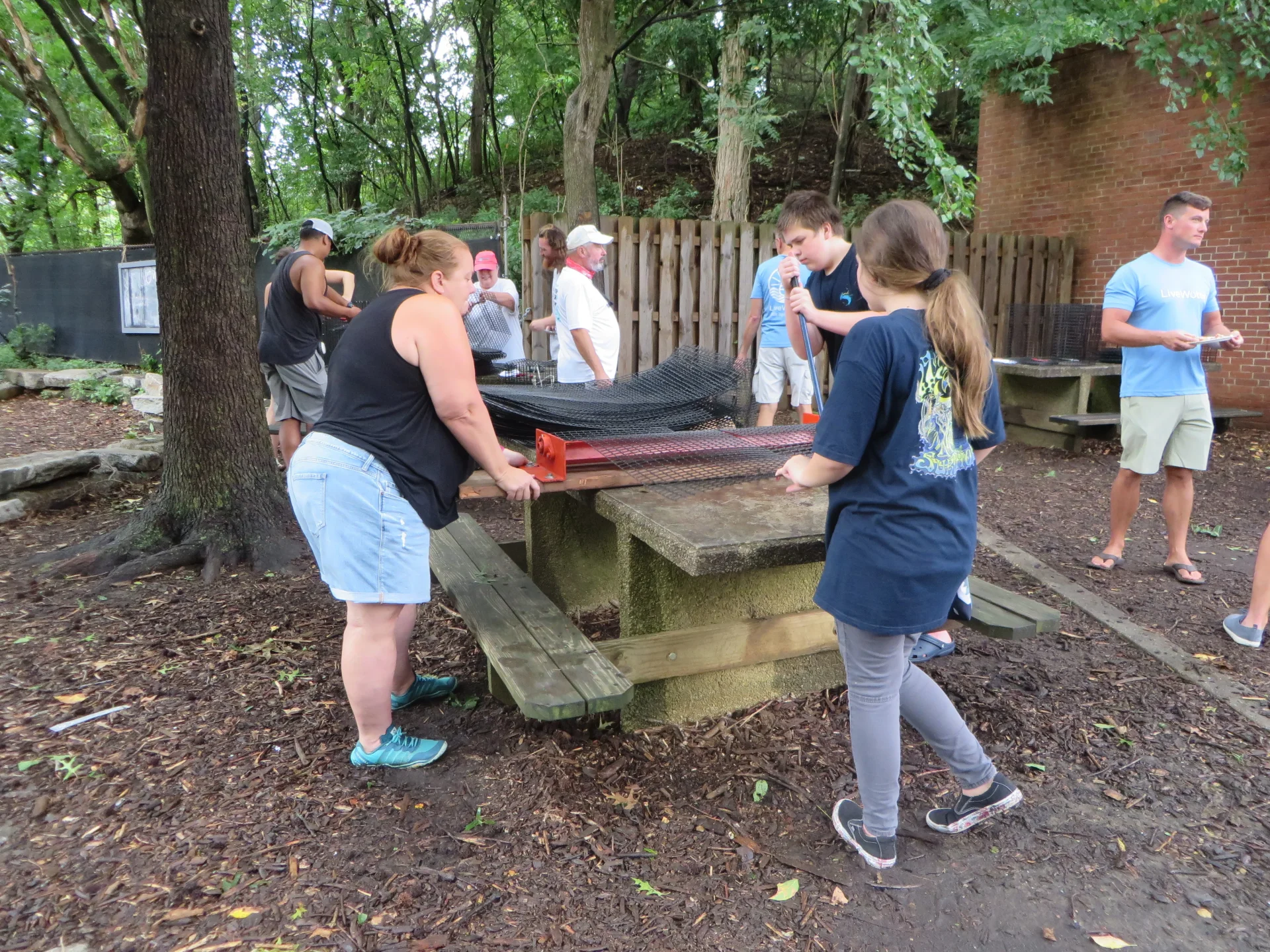 Volunteers building oyster cages