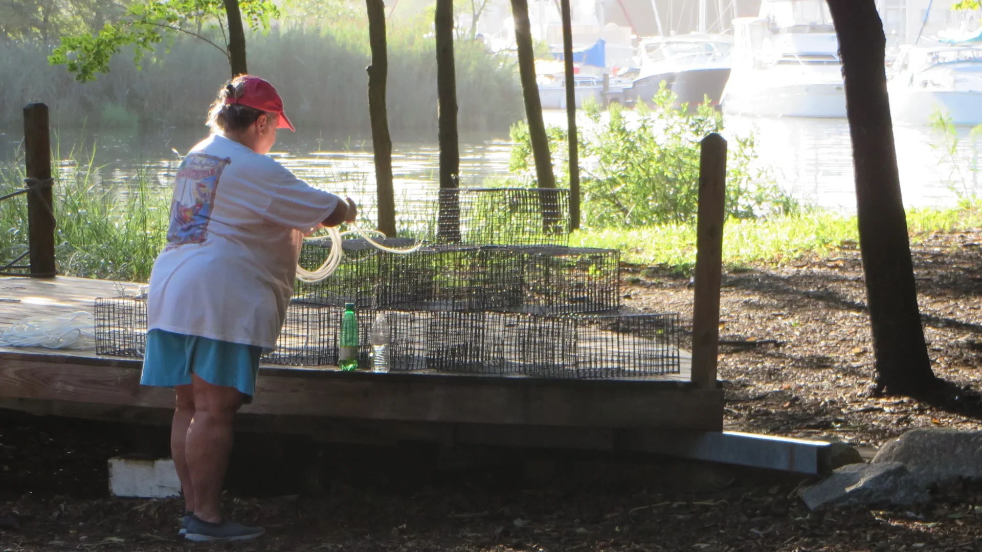 Volunteer building an oyster cage