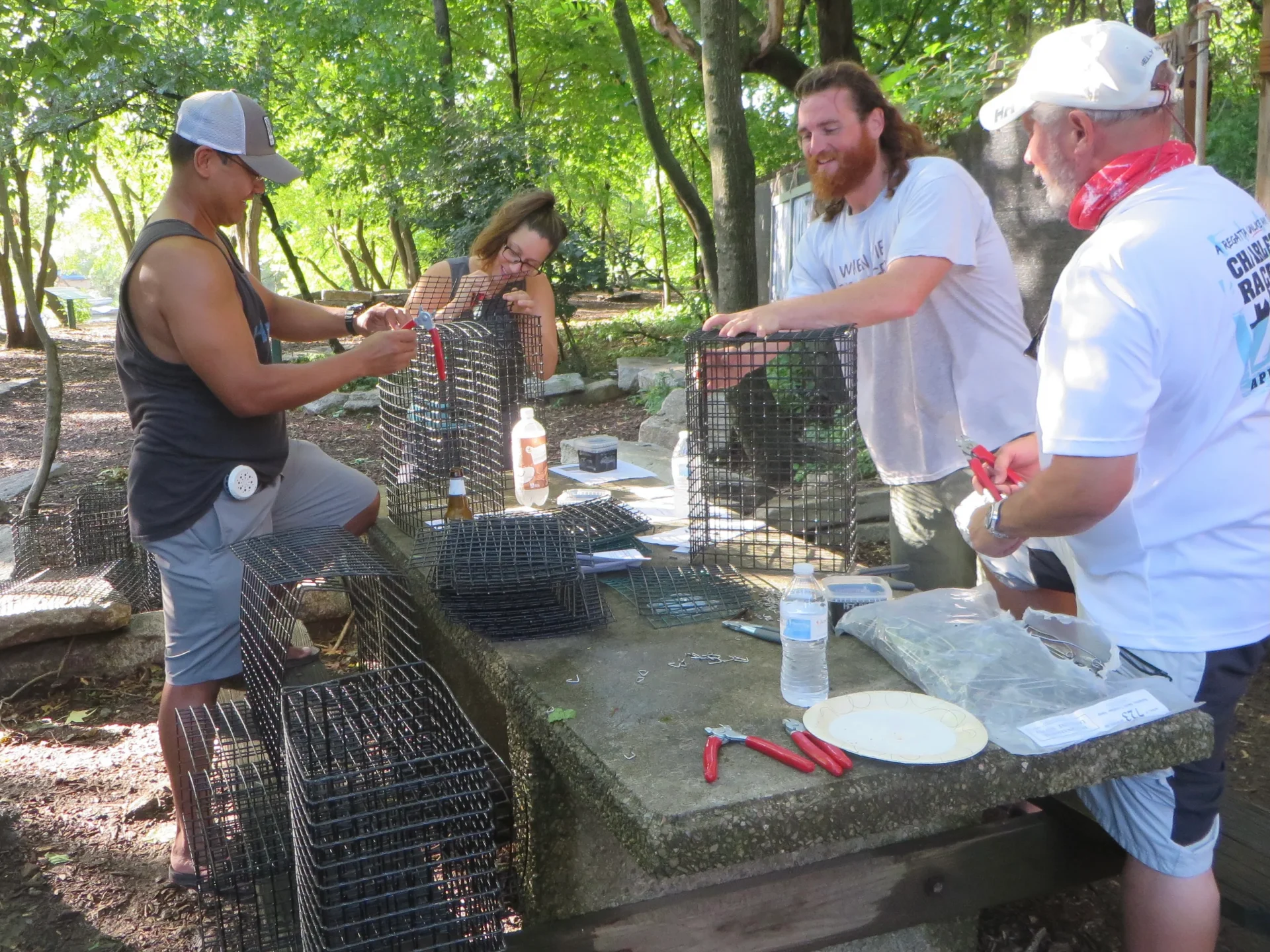 Volunteers building oyster cages