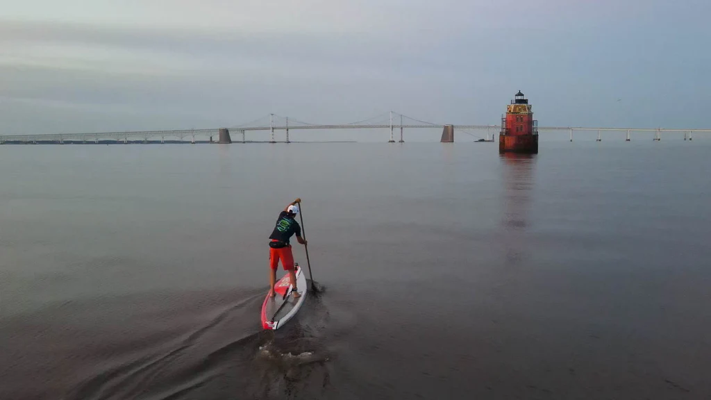 Paddle boarder makes his way across the chesapeake bay