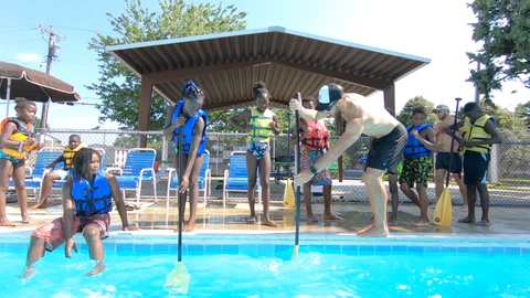 Introduction to stand up paddle boarding at harbor house pool