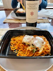  Eggplant Rollatini served over Angel Hair pasta, paired with a AVV Homestead Red Blend.