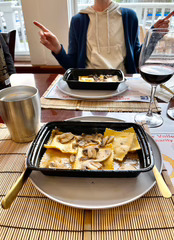  Osso Buco Raviolo with Porcinis and a Red Wine Demi-Glace, paired with a AVV Cabernet Sauvignon.