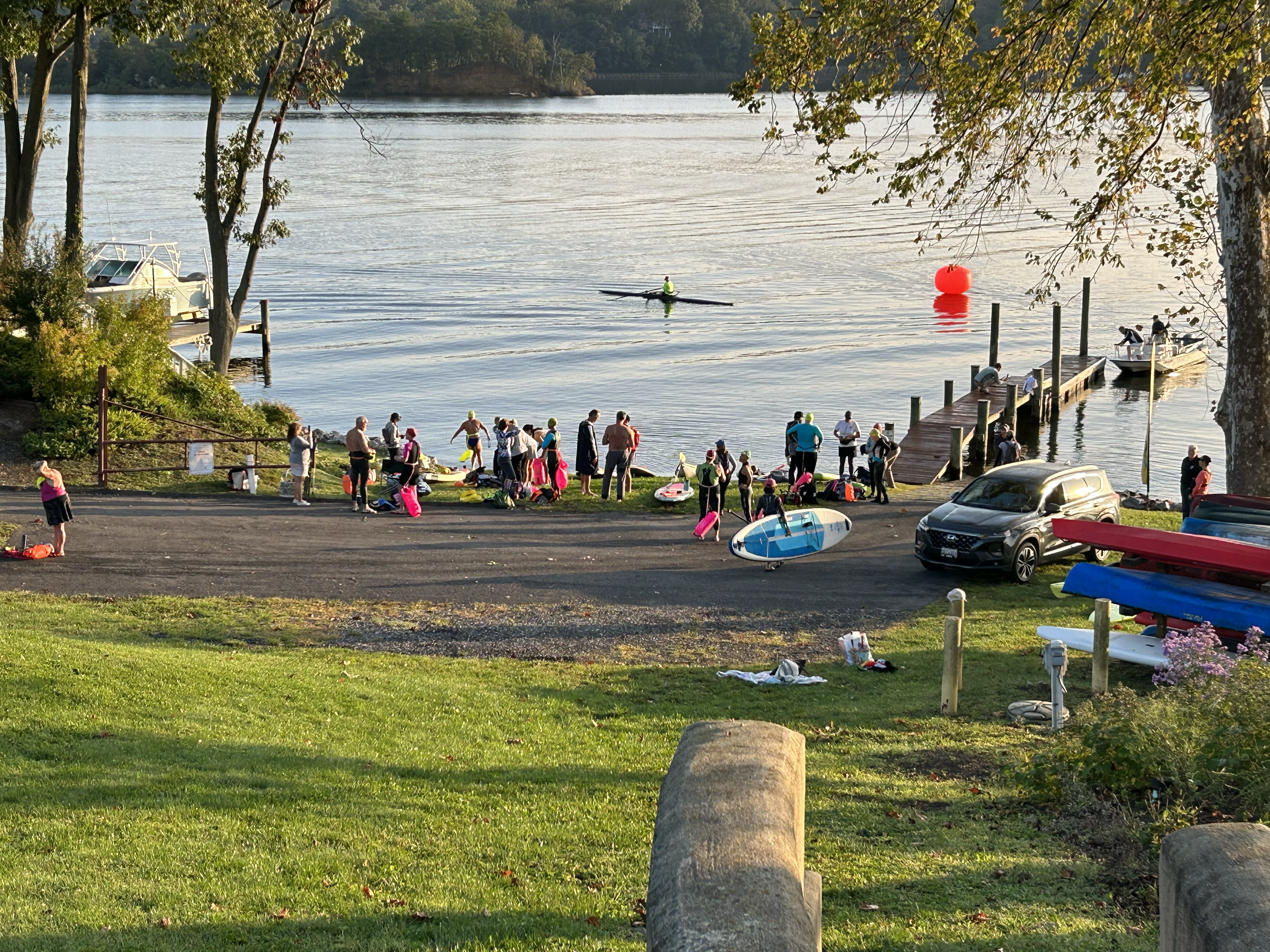 A group of people stand by the waters edge